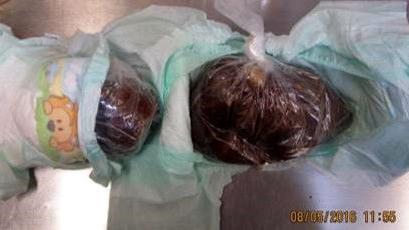 Sinaloa woman fined $300 after chorizo found in suitcase